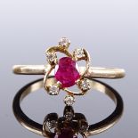 An Art Nouveau style unmarked gold ruby and diamond dress ring, setting height 11.8mm, size approx