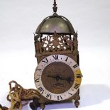 A brass-cased lantern clock, dial inscribed James Pool, striking on a bell with single hand, ...