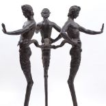 A fine quality 19th century bronze table base in the form of 3 standing satyrs, joined by a