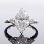 An 18ct white gold 3-stone diamond ring, principle marquise brilliant-cut diamond weighing approx