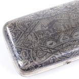 A 19th century Russian silver and niello rectangular tobacco box, curved edges with possible St
