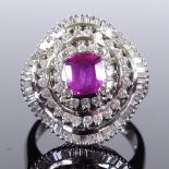 A large 14ct white gold ruby and diamond cluster cocktail ring, total diamond content approx 1.