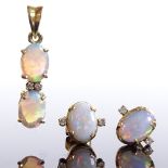 An 18ct gold cabochon opal and diamond pendant and earring set, pendant height excluding bale 18.