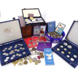 A large collection of modern British coins, commemorative coins, and world coins, and a coin