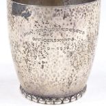 An Evald Nielsen Danish silver beaker, planished cylindrical form with beaded foot, hallmarks