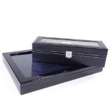 A black leather 6-section watch box, and an 8-section pocket watch box, largest length 38cm (2)