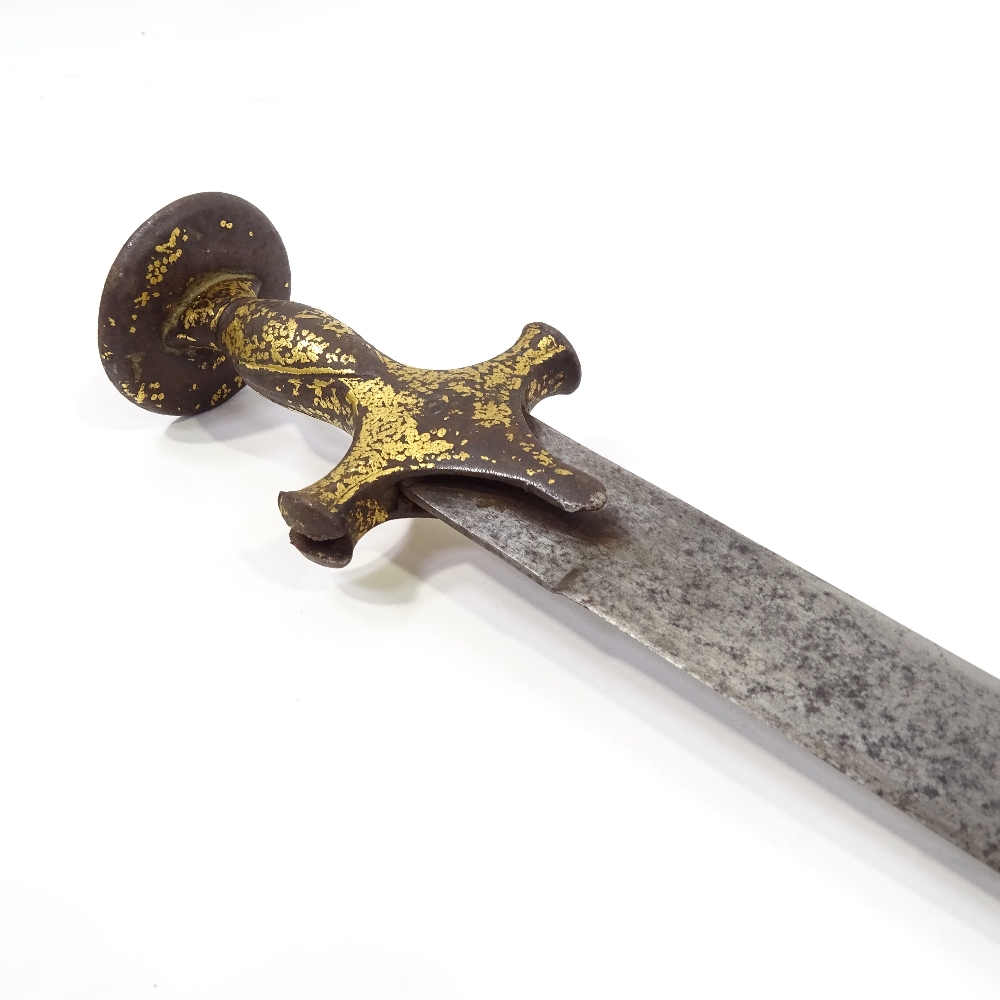 A Middle Eastern curved sword with gilded iron handle, 18th or 19th century - Image 3 of 3