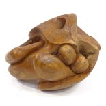 A polished root wood abstract carving, unsigned, length 43cm