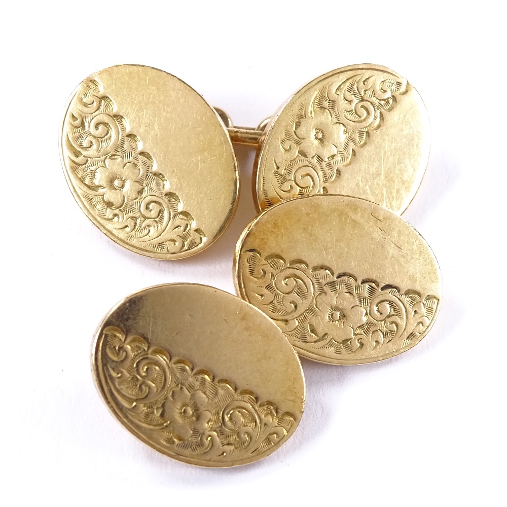 A pair of Victorian 18ct gold oval panel cufflinks, half-engraved floral decoration, indistinct - Image 2 of 4