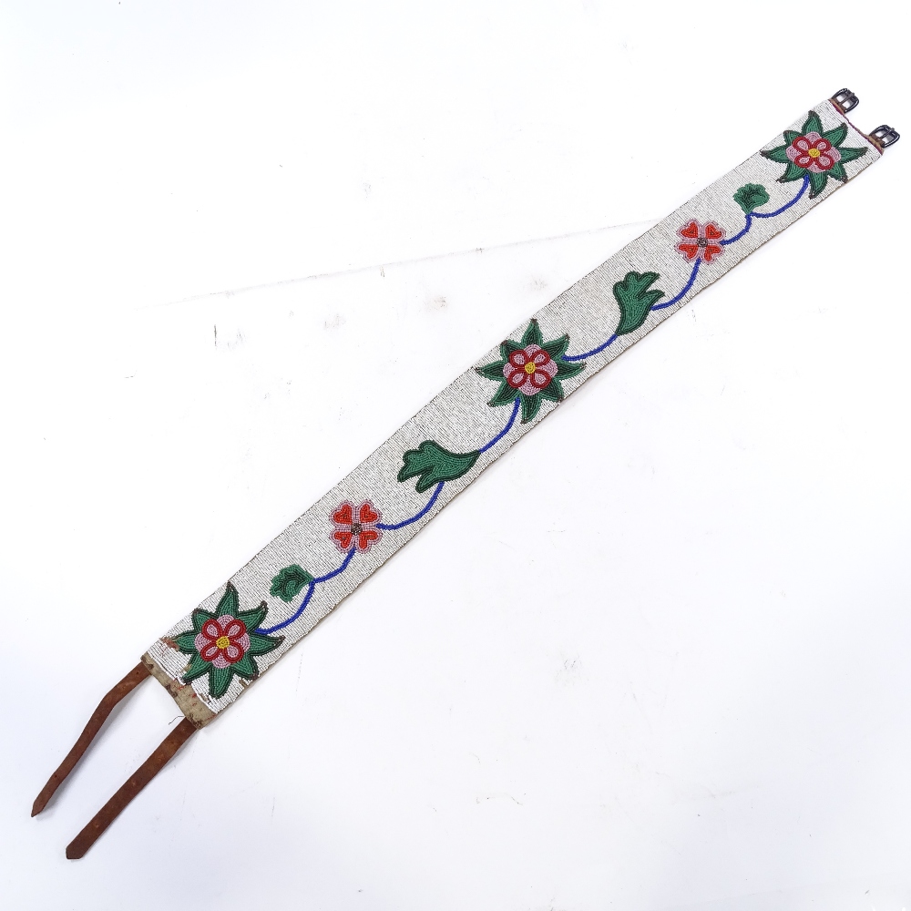 A Native American floral design beadwork belt, early to mid-20th century, band width 7.5cm - Image 2 of 3