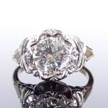 An unmarked gold 1.82ct solitaire diamond ring, high openwork settings and bridge, unmarked settings
