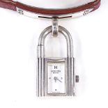 HERMES - a lady's silver-cased Kelly padlock quartz wristwatch, silvered dial with quarterly dot