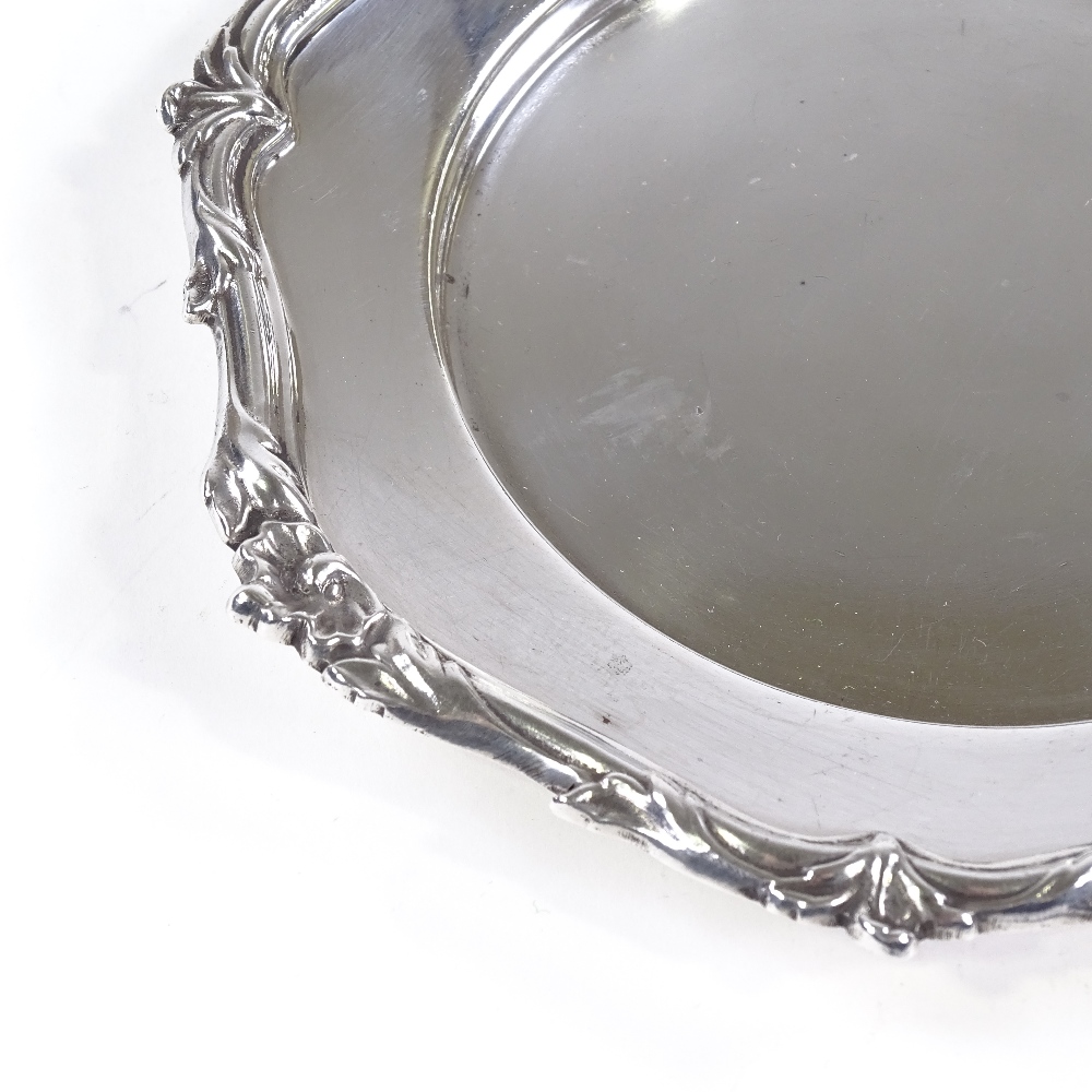 An Elizabeth II silver butter dish, cast floral rim, no glass liner, by James Dixon & Sons Ltd,