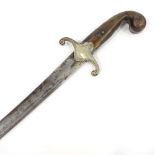 A Continental curved sword, white metal cross hilt with horn grips, 18th or 19th century