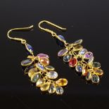 A pair of unmarked gold coloured sapphire cluster grape earrings, shepherd hook fittings, height