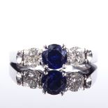 A platinum 3-stone sapphire and diamond trilogy ring, total diamond content approx 0.5ct, setting