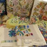 Various embroidered cushions and hand embroidered upholstery material