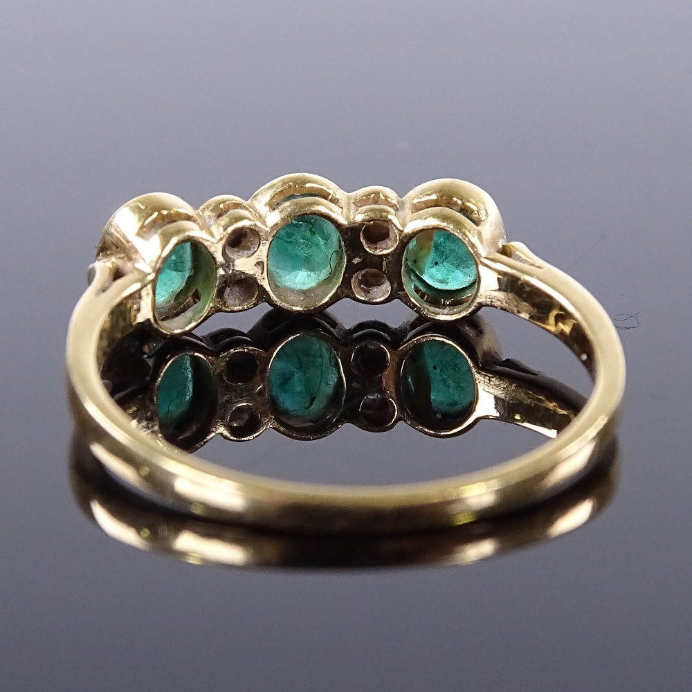 An 18ct gold 7-stone emerald and diamond half hoop ring, total diamond content approx 0.04ct, - Image 2 of 4