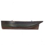A 19th century painted solid wood half boat hull, length 97cm