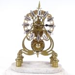 A brass skeleton clock with chain driven single fusee movement on white marble base, overall