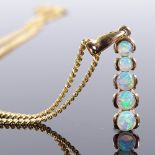 A 9ct gold graduated cabochon black opal pendant necklace, on 9ct curb link chain, pendant height