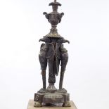 An Empire style patinated bronze table lamp, supported by 3 heraldic eagles, probably early 20th