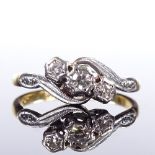An Edwardian 18ct gold 3-stone diamond crossover ring, total diamond content approx 0.12ct,