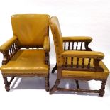 A pair of Victorian oak-framed leather upholstered armchairs