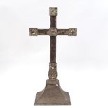 An Arts and Crafts electroplate cross, inscription on front edge dated 1927, no makers marks, height