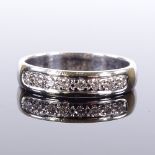 An 18ct white gold 8-stone diamond half eternity ring, band width 4.1mm, size M, 4.3g Very good