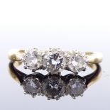 An unmarked gold 3-stone diamond ring, total diamond content approx 0.6ct, setting height 4.9mm,