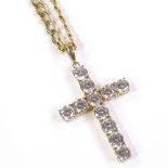 A 14ct gold cubic zirconia cross pendant necklace, on 9ct flat curb link chain, pendant height