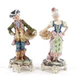 A pair of French ceramic figures, height 21cm