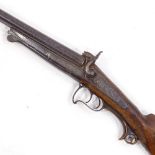 A 19th century Continental double-barrel pinfire sporting gun, with carved horn trigger support