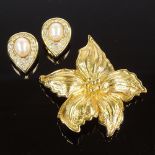 CHRISTIAN DIOR - a Vintage gold plated flower head brooch, and a pair of pearl and rhinestone