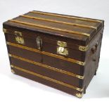 An early wood leather and brass-bound travelling trunk by Moynat, original label inside lid, 90cm