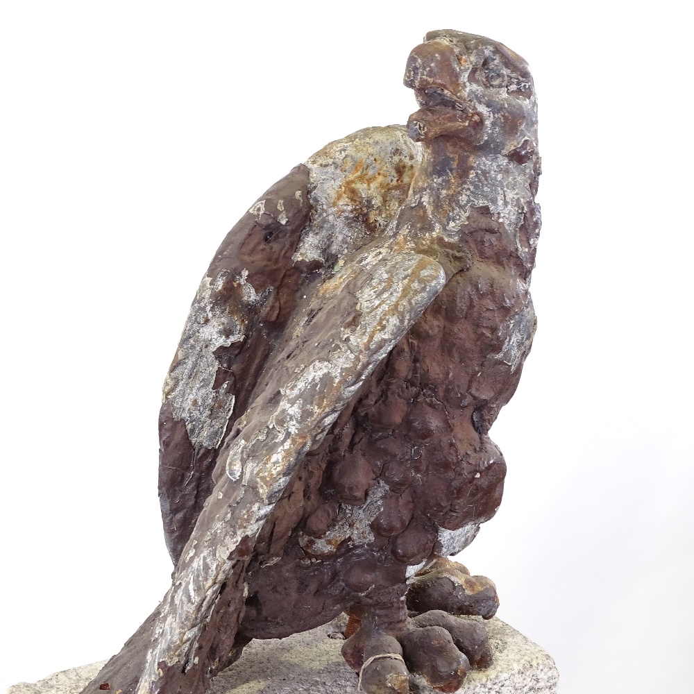 A 19th century cast-iron architectural heraldic eagle, mounted on natural stone base, overall height - Image 2 of 3