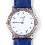 HERMES - a stainless steel Arceau quartz wristwatch, white dial with painted Arabic numerals and
