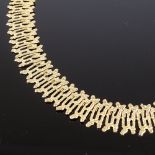 A Vintage 9ct gold abstract collar necklace, textured openwork settings, maker's marks JAM,