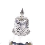A large Victorian silver sugar caster, baluster form with gadrooned rim, reeded and embossed foliate