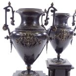 A pair of Victorian slate marble and brass-mounted urns on pedestals, height 35cm