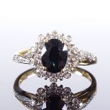 A 9ct gold sapphire and diamond cluster ring, total diamond content approx 0.25ct, setting height
