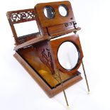 A Victorian mahogany table-top stereoscopic card viewer, with pierced fretwork panel and ivory