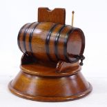 A treen barrel design match dispenser, circa 1900, diameter 14cm