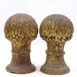 A pair of Victorian carved giltwood wheatsheaf design finials, height 35cm, diameter 20cm