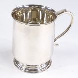 An Elizabeth II silver pint mug, plain cylindrical form with fluted rim, by Cooper Brothers &