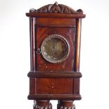 A 19th century carved mahogany-cased floor standing clock, with brass dial, height 138cm