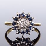 An 18ct gold sapphire and diamond cluster ring, openwork settings and bridge, setting height 12.6mm,