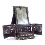 An ornate Chinese hardwood and mother-of-pearl marquetry inlaid dressing cabinet, the lid having