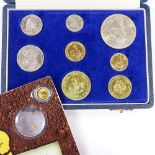 A South African part-set of 1961 coins, including one and two rand gold coins, together with